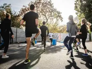 fitness-and-nutrition a group of peolpe exercising outdoors